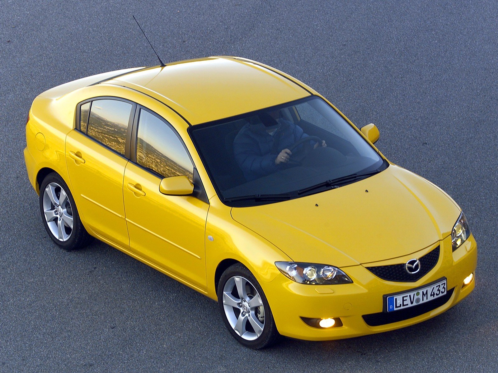 mazda 3 old yellow